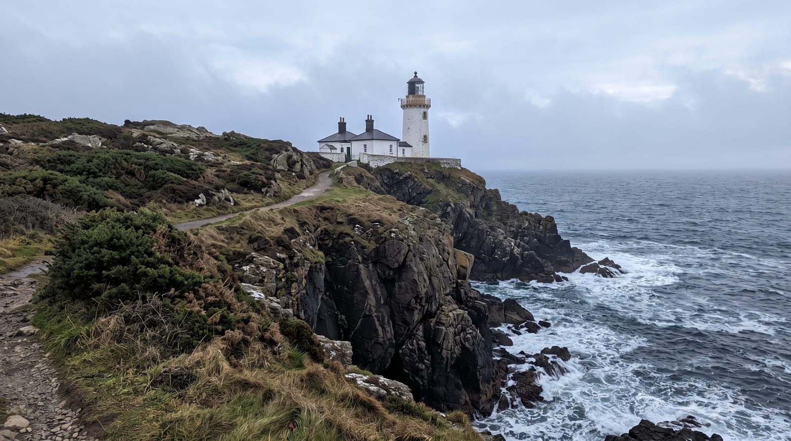 The Lighthouse and Rugged Coast
